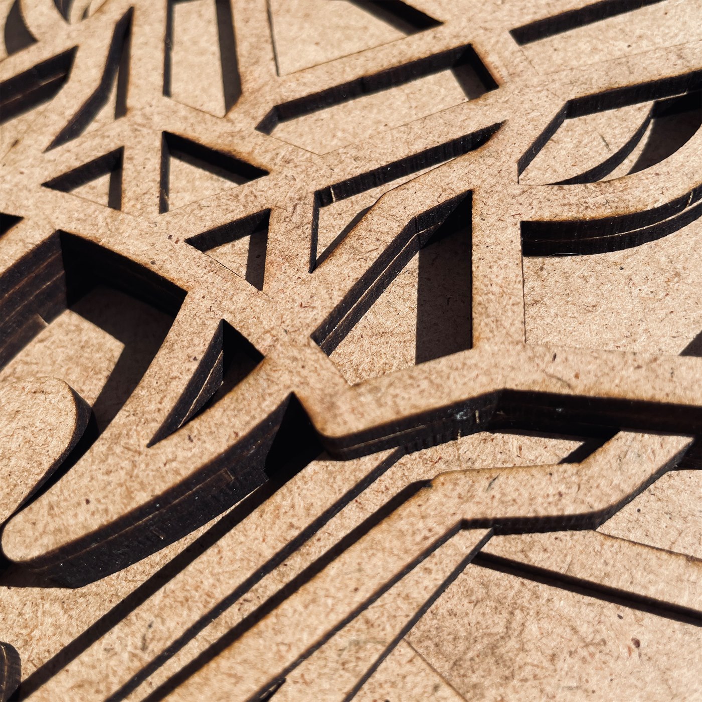 Cobra Geometry Macro Detail of Laser Cut Polygons and Hood Bevels