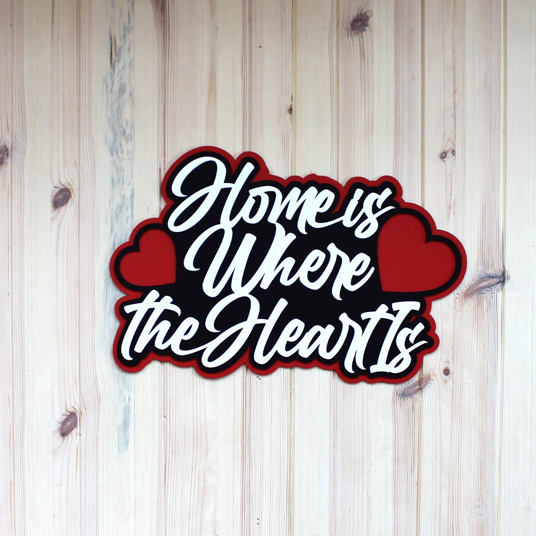 Home Is Where the Heart Is Mounted on Interior Wall